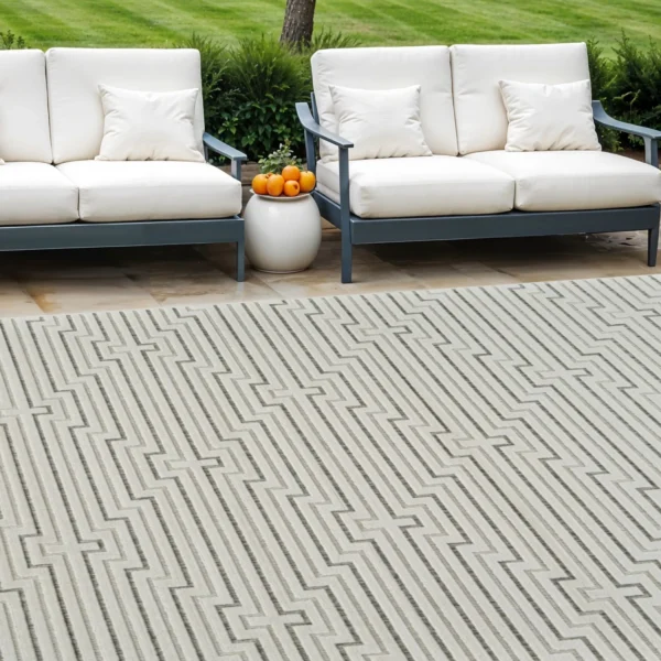 6' X 9' Cream and Beige Geometric Distressed Indoor Outdoor Area Rug